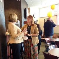 2 women conversing in the women's center